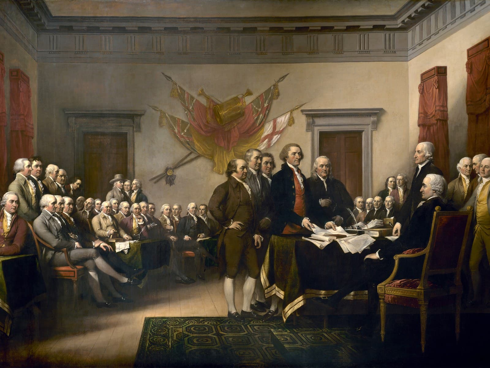 John Trumbull’s painting of the Declaration of Independence, with the Committee of Five standing before John Hancock and members of Congress in a hall.